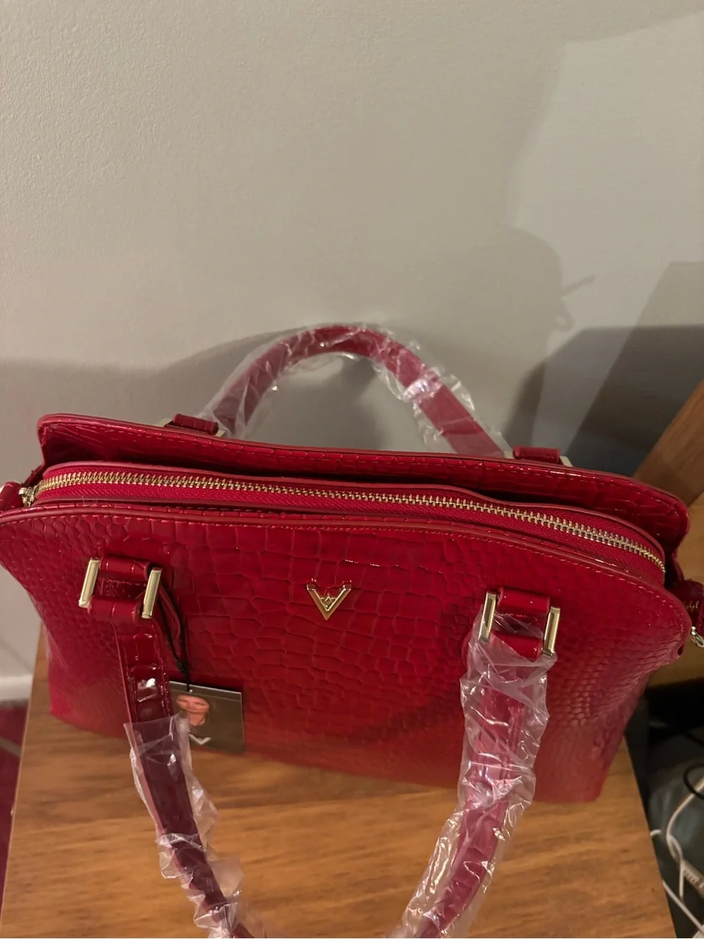 Vanessa Williams Lush round satchel vibrant red crocodile-embossed faux leather